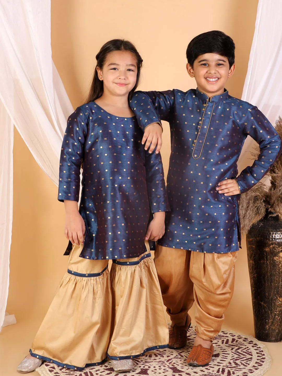 Jashvi Silk Blend Blue And rose Gold Woven Sibling Set